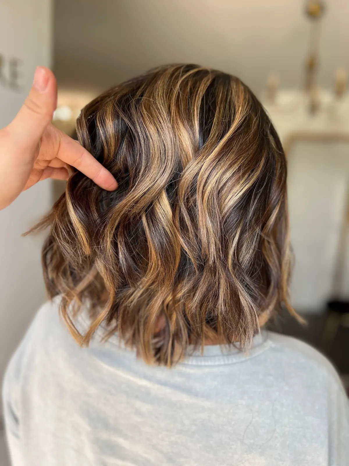 Réalisation coloration par SYA Coiffure à Cannes
